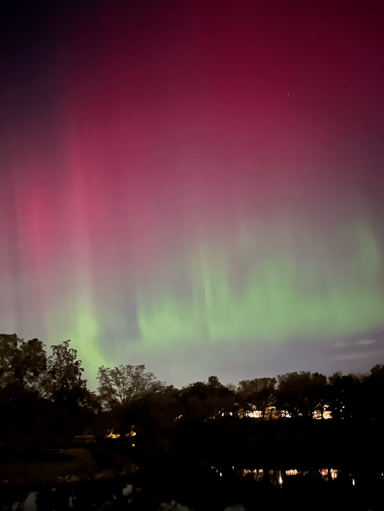 Pink and green northern lights
